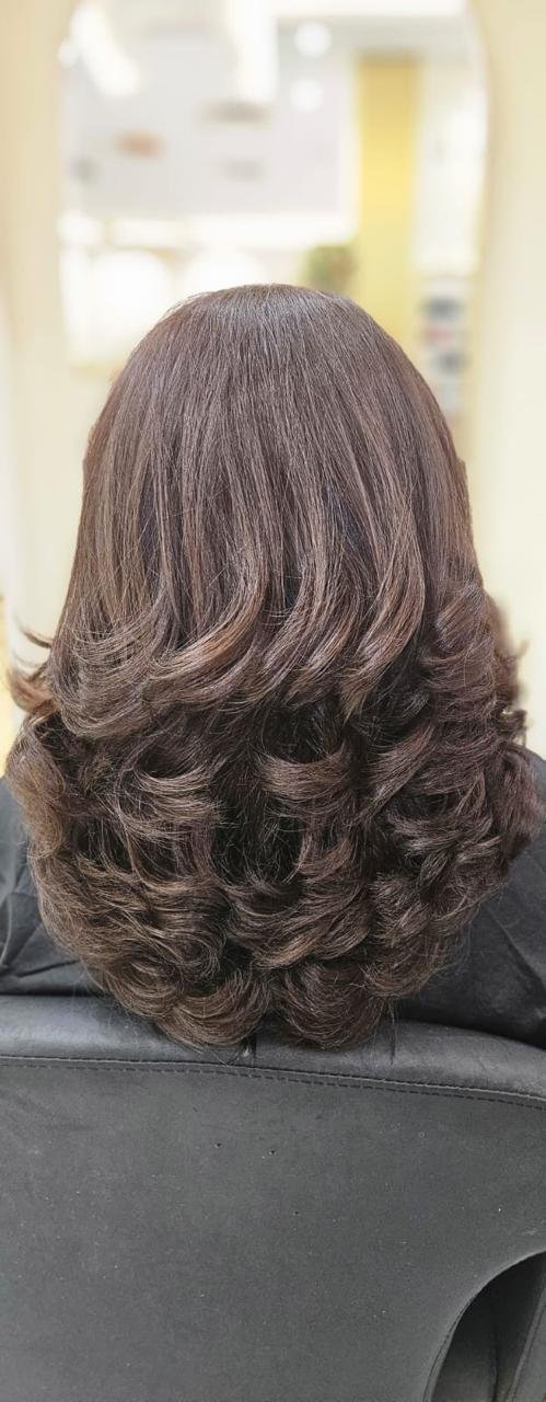 Bouncy blowout curls styling result at Beloved Beauty Salon Dubai