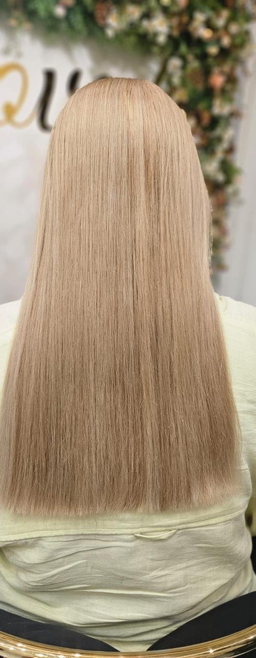 Sleek straight blonde hair colour result at Beloved Beauty Salon Dubai